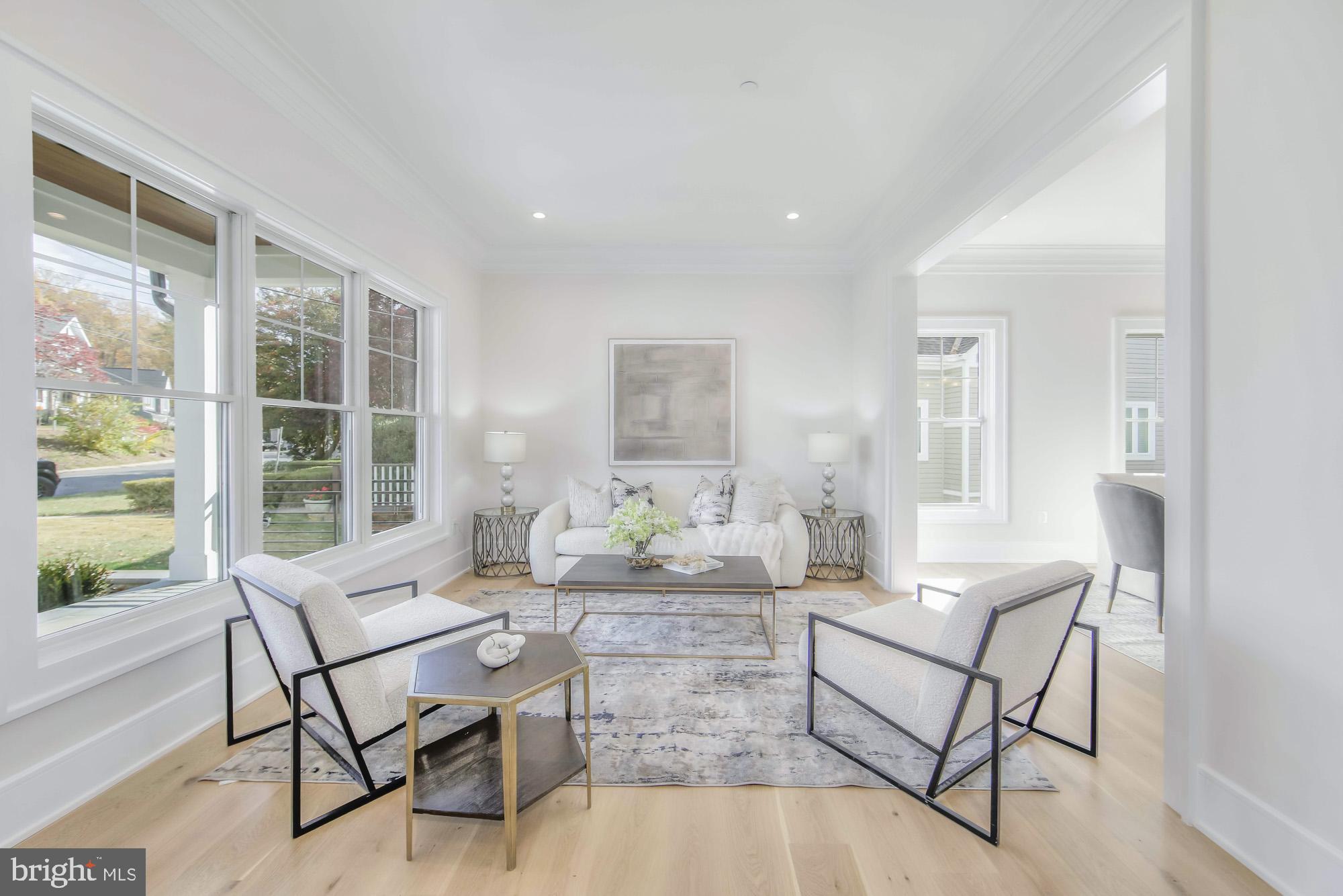 6012 Sonoma Road Bethesda, MD 20817 - Photo 4 of 57 a living room with furniture and a large window