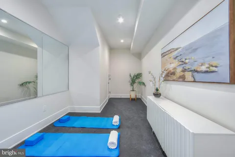 a view of a two chairs in the balcony