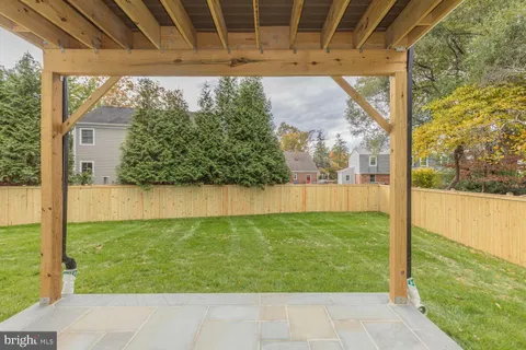 a front view of a house with yard