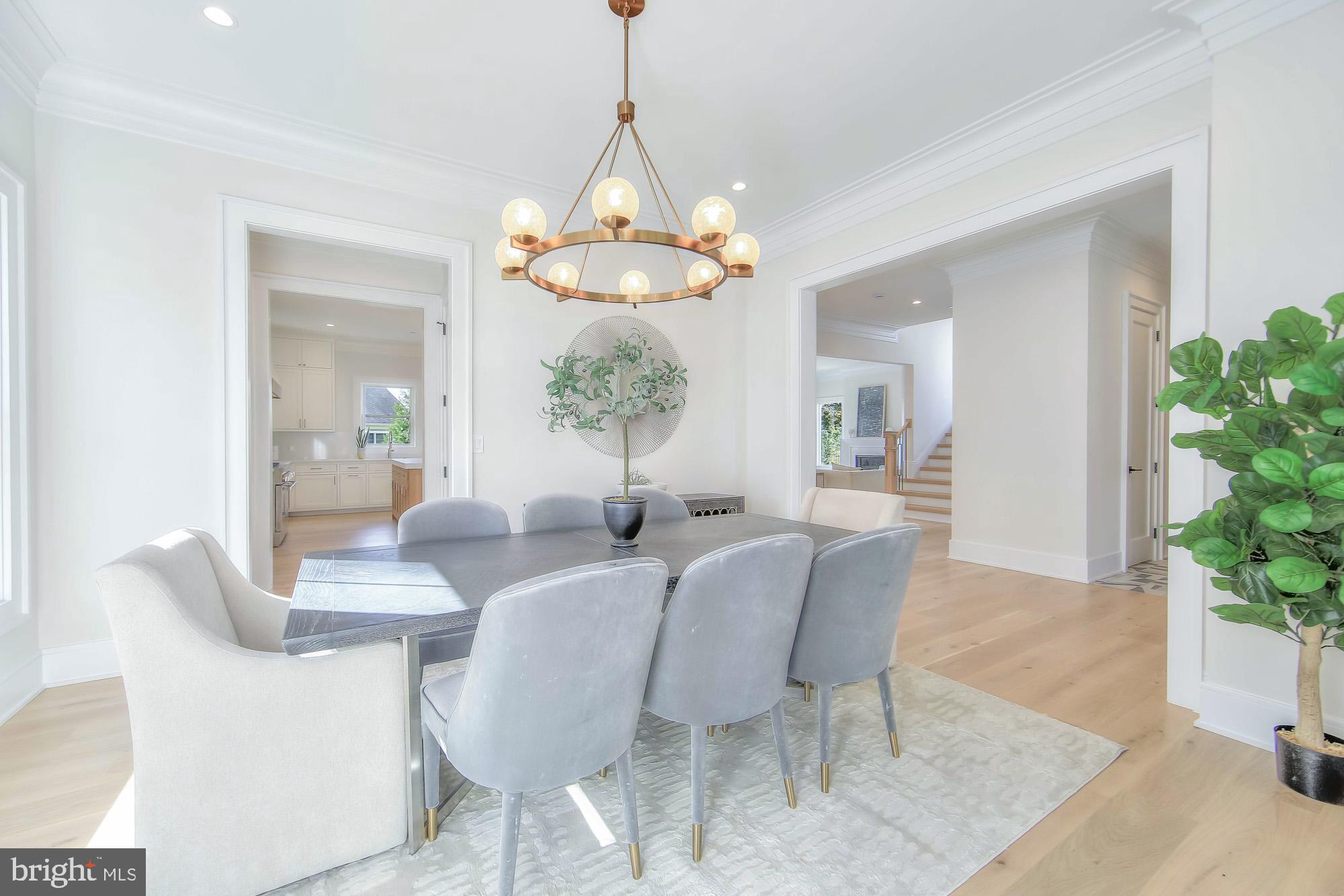 6012 Sonoma Road Bethesda, MD 20817 - Photo 7 of 57 a dining room with furniture a chandelier and window