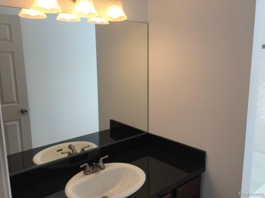 3084 Gerald Avenue Rochester, MI 48307 - Photo 26 of 47 Custom oversized mirrors throughout!