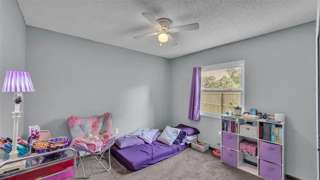 a view of a bedroom with closet area