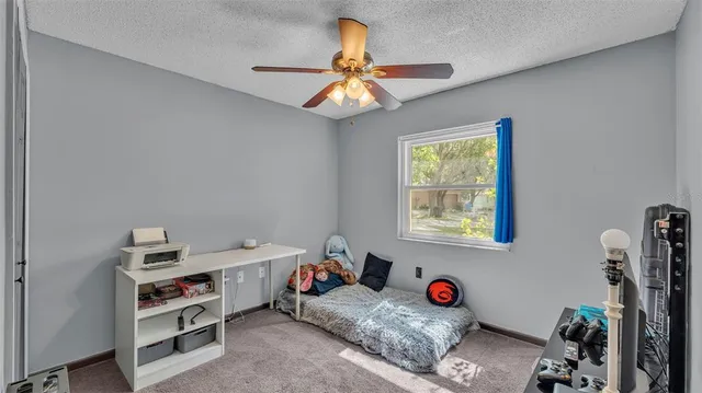 a room with a desk and closet