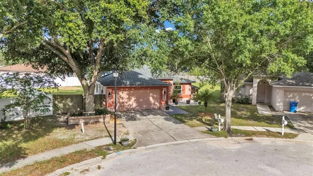 a house with trees in front of it