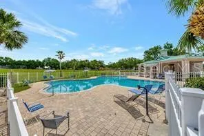 a view of outdoor space with garden and trees