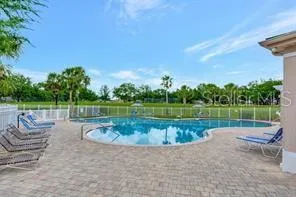 a view of a park with large trees