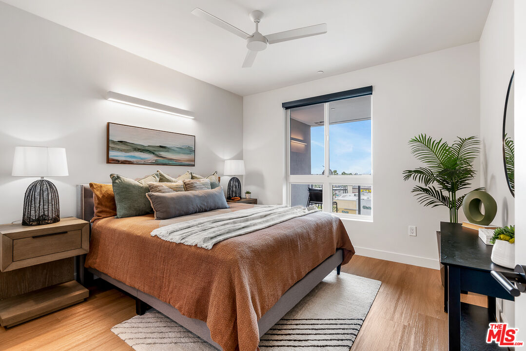 10601 Washington Boulevard, Unit 428 Culver City, CA 90232 - Photo 12 of 29 a bedroom with bed and a potted plant