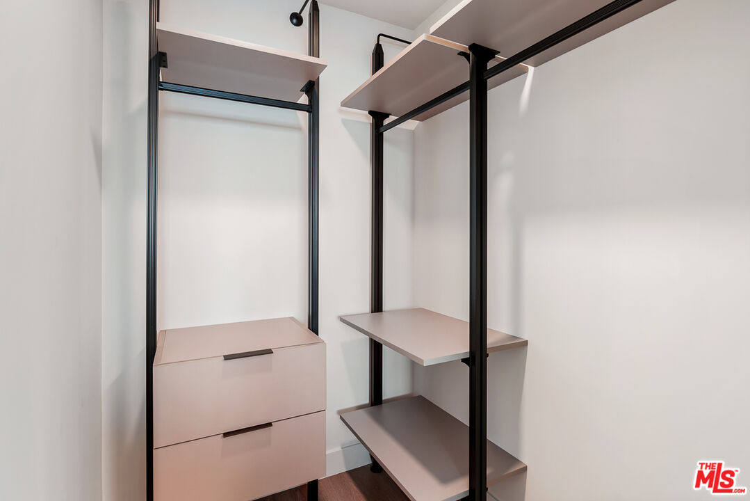 10601 Washington Boulevard, Unit 428 Culver City, CA 90232 - Photo 14 of 29 a view of a hallway with wooden floor and stairs