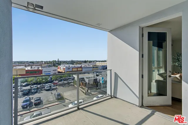 a view of a terrace with seating area