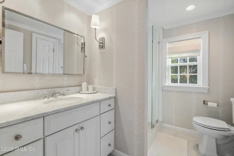 a bathroom with a sink and a toilet