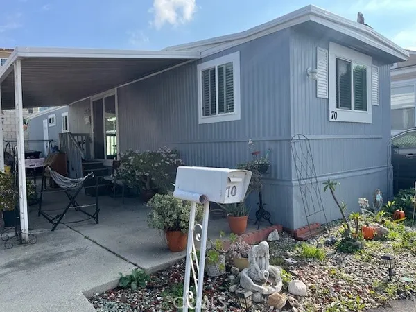 a house view with a garden space