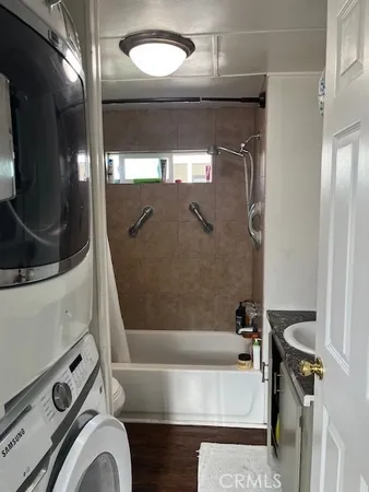 view of bathroom with bathtub and shower