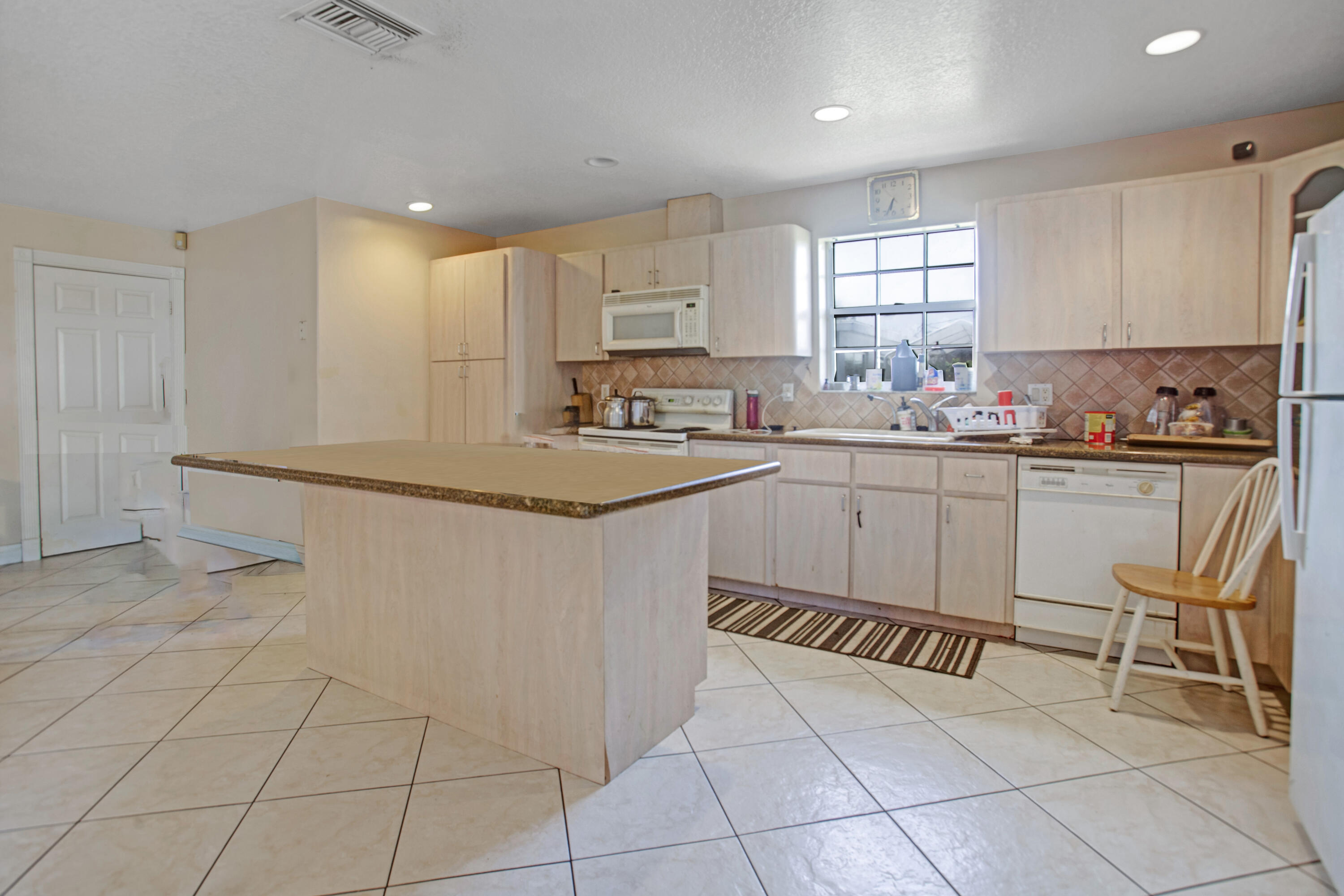 5772 Haverhill Road West Palm Beach, FL 33407 - Photo 3 of 11 IMG_7083_4_5_6_7 copy removed