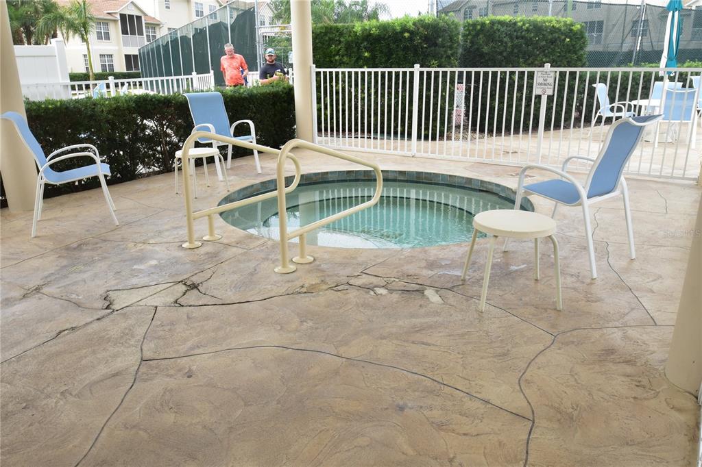 4235 Castle Bridge, Unit 1216 Sarasota, FL 34238 - Photo 12 of 18 a view of a chairs and tables in the roof deck