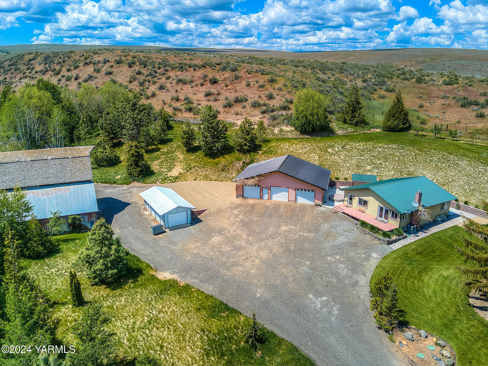 1071 Humphrey Road Tieton, WA 98947 - Photo 1 of 40 an aerial view of a house with a yard
