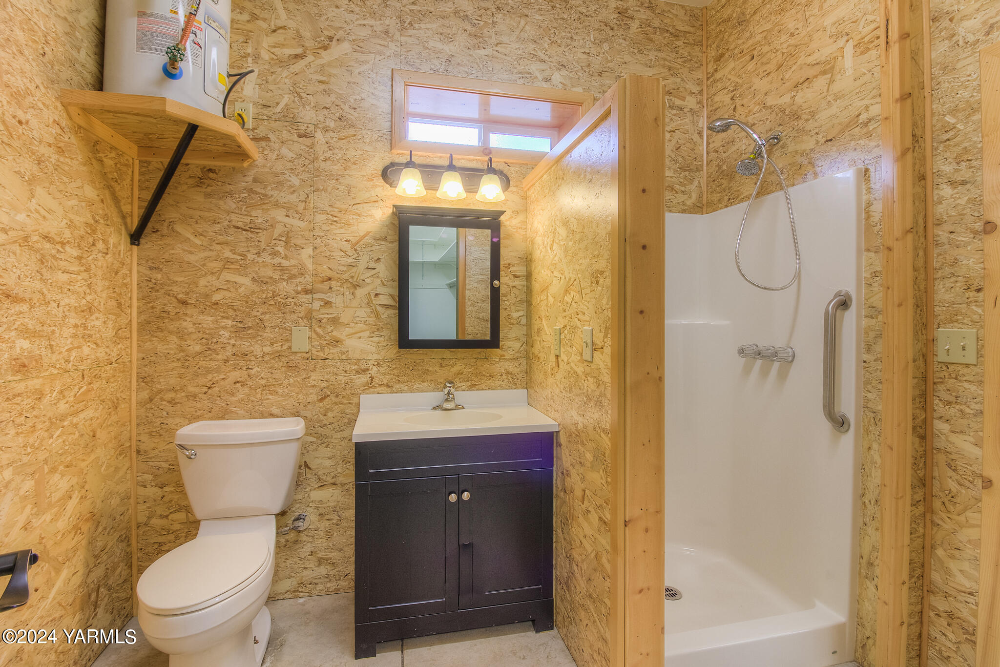 1071 Humphrey Road Tieton, WA 98947 - Photo 24 of 40 a bathroom with a toilet sink and shower