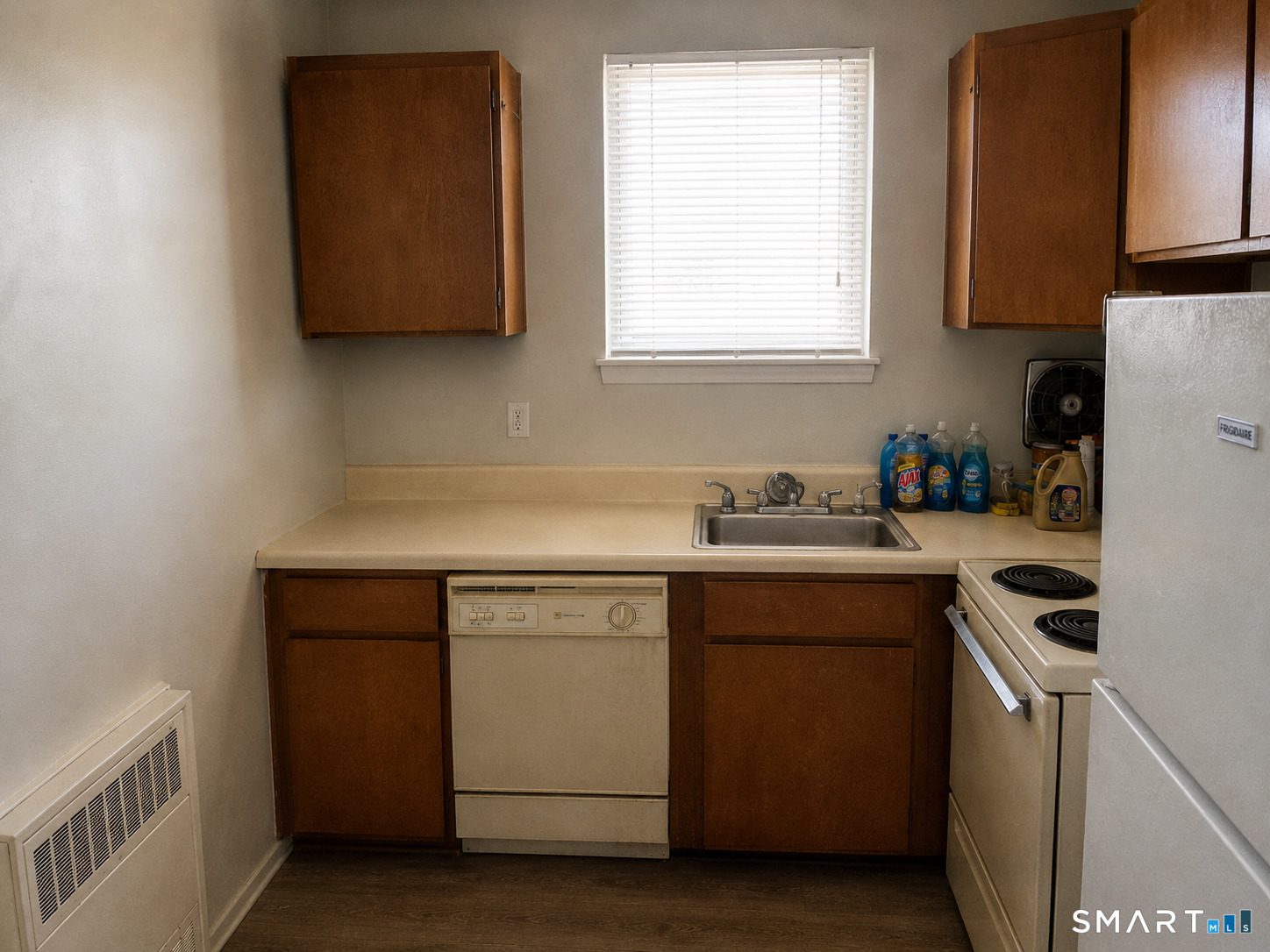 53 Wolcott Hill Road, Unit C12 Wethersfield, CT 06109 - Photo 11 of 25 a kitchen with stainless steel appliances granite countertop a sink and a microwave