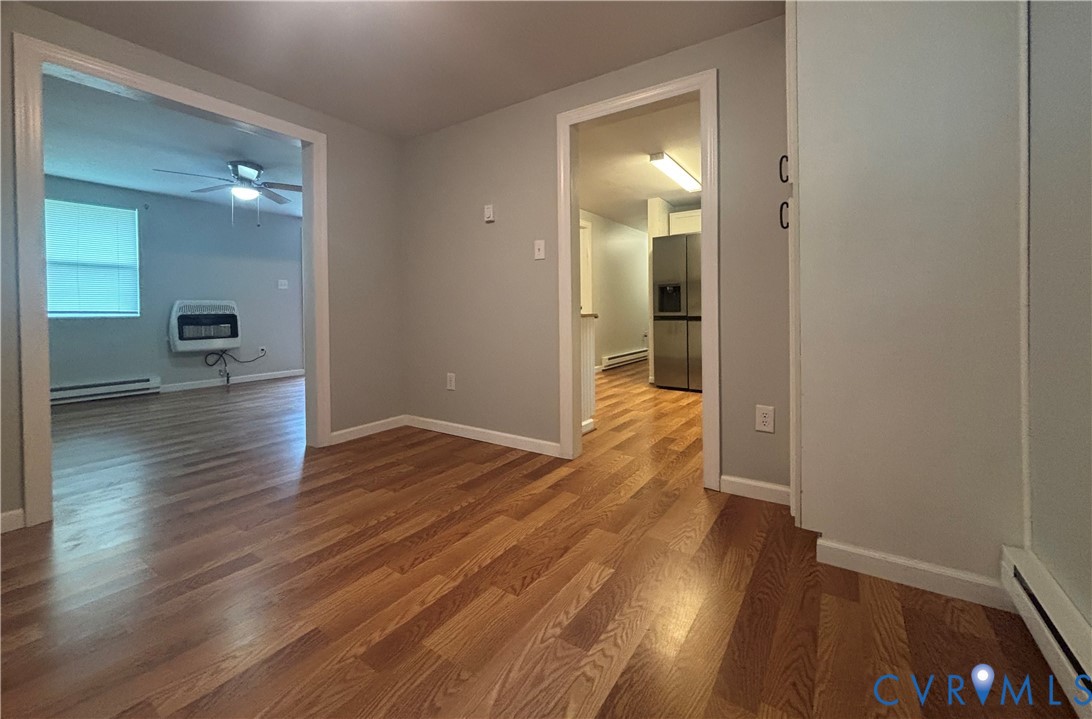 128 North Sylvan Road Waverly, VA 23890 - Photo 9 of 22 View from dining room into living room and kitchen