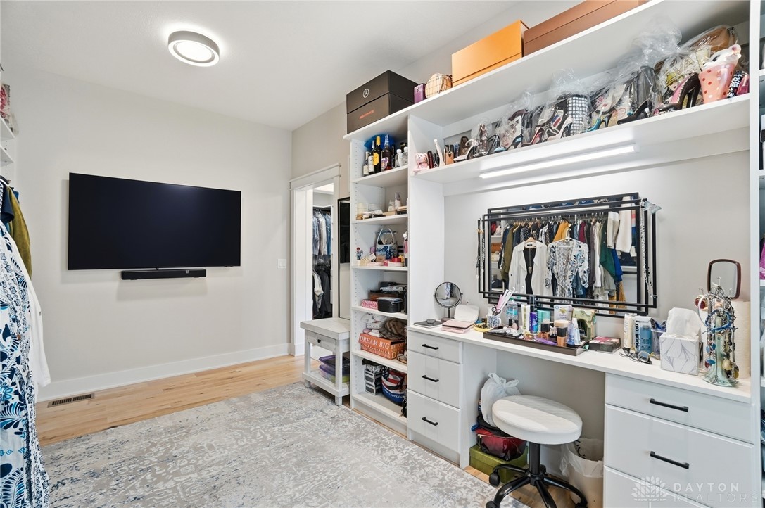 1247 Normandy Rue Dayton, OH 45458 - Photo 29 of 76 This spacious walk-in closet offers ample storage and a dedicated vanity area.