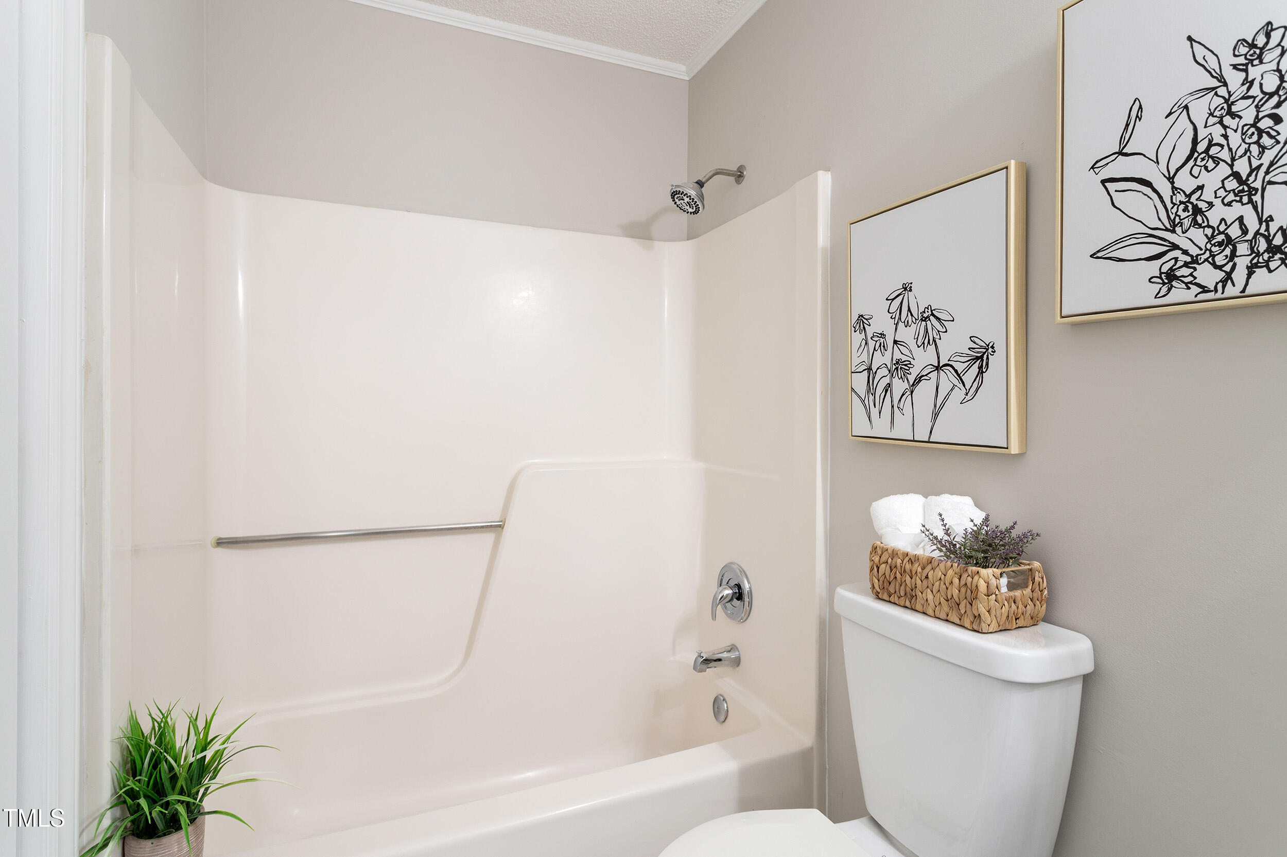 118 Rhum Place Garner, NC 27529 - Photo 20 of 26 a bathroom with a toilet and a bathtub