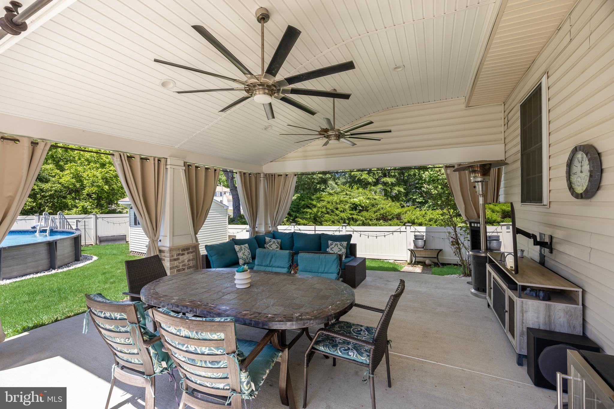 2 Rothbury Drive Lumberton, NJ 08048 - Photo 2 of 54 a view of a patio with a table chairs and a backyard