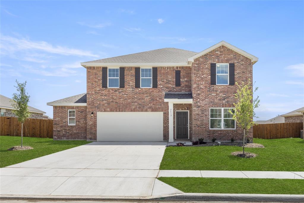 2612 Sanders Crk Road Glenn Heights, TX 75154 - Photo 1 of 1 a front view of a house with a yard and garage
