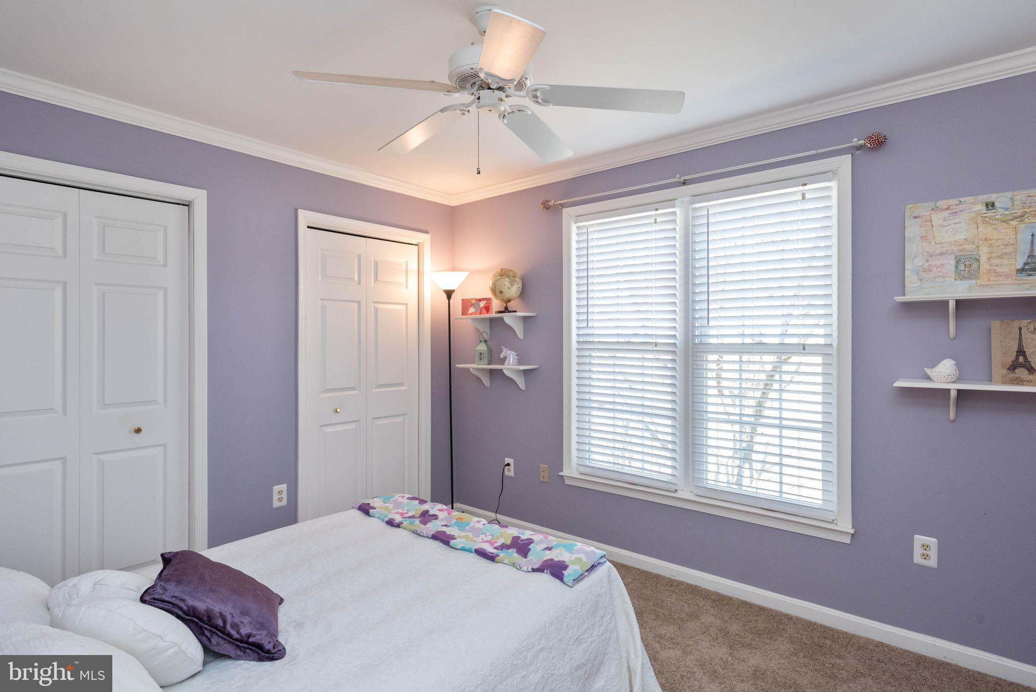 8608 Ashcroft Drive Laurel, MD 20708 - Photo 27 of 45 a bedroom with a bed dresser and a window