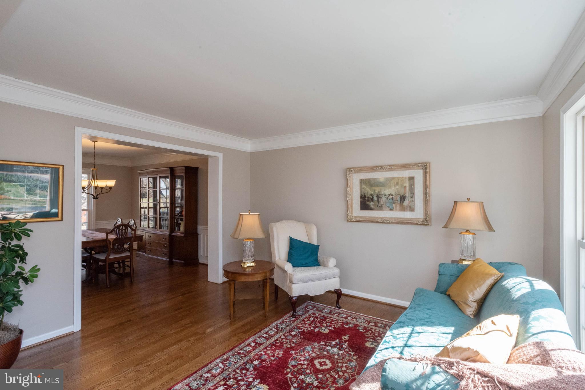 8608 Ashcroft Drive Laurel, MD 20708 - Photo 4 of 45 a living room with furniture and wooden floor