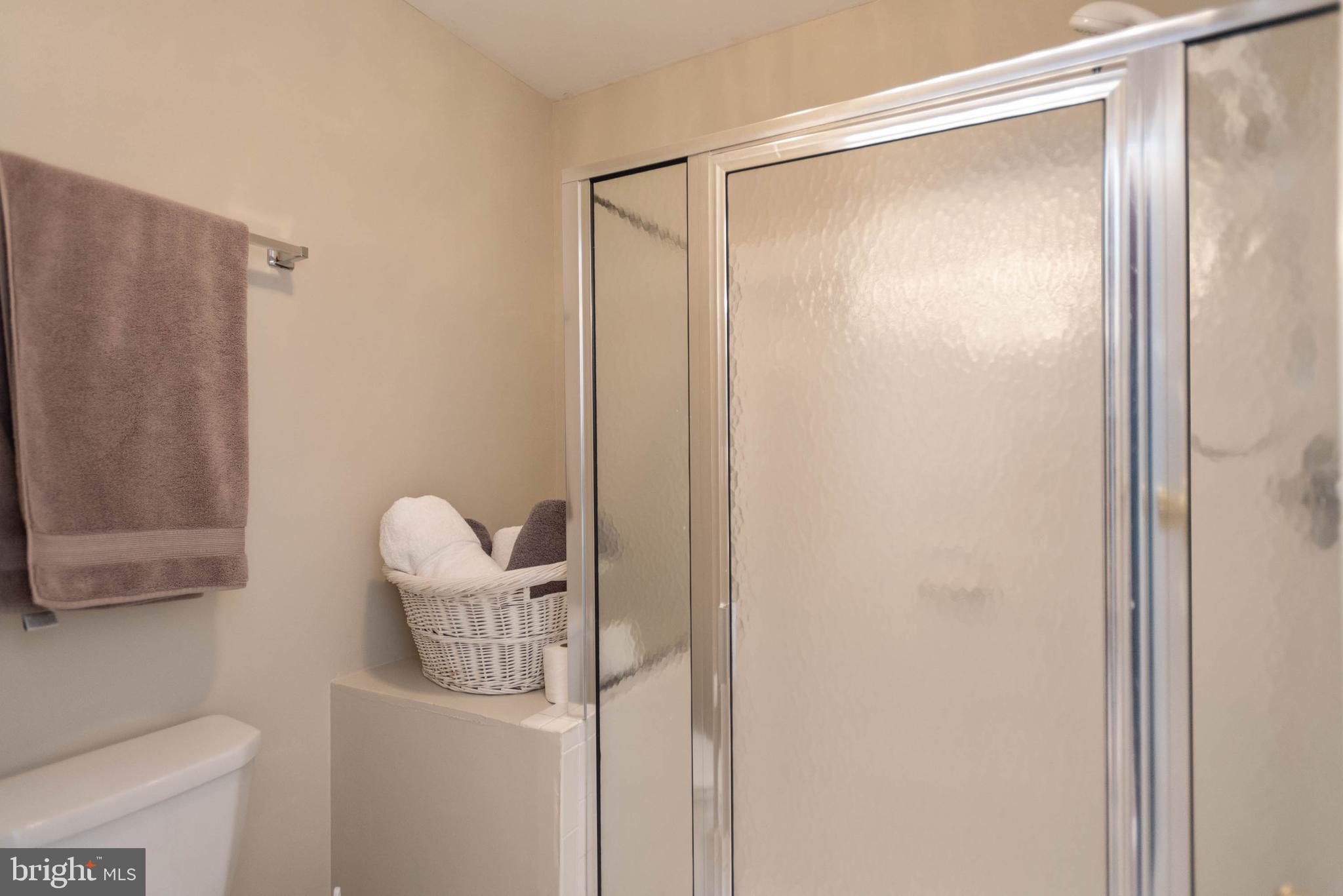 8608 Ashcroft Drive Laurel, MD 20708 - Photo 34 of 45 a bathroom with a shower and a toilet