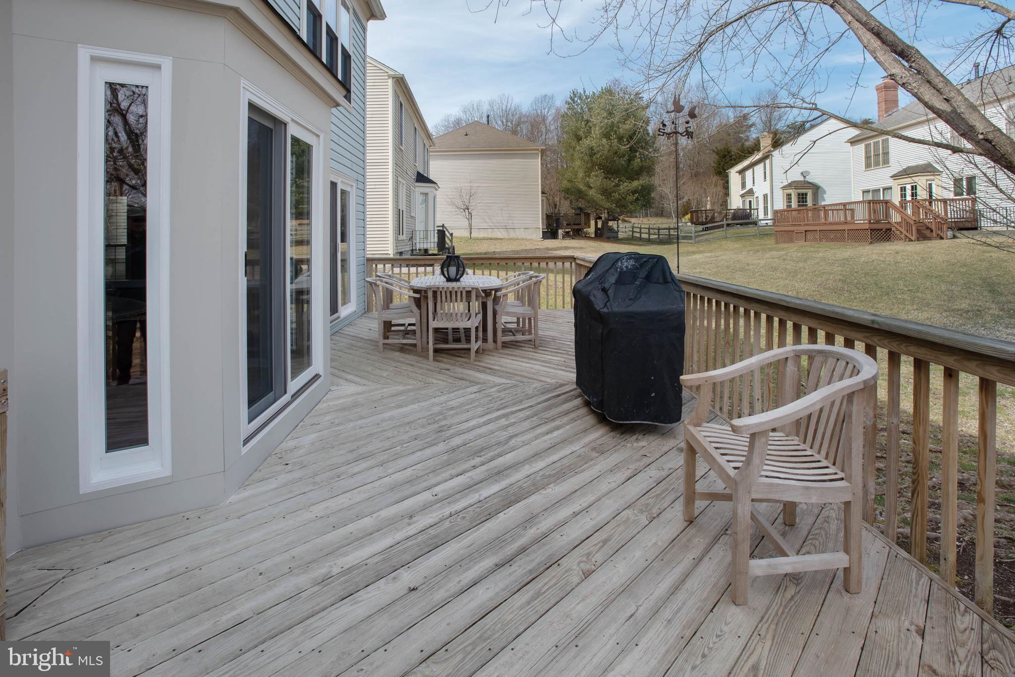 8608 Ashcroft Drive Laurel, MD 20708 - Photo 39 of 45 a view of balcony with seating space and wooden floor