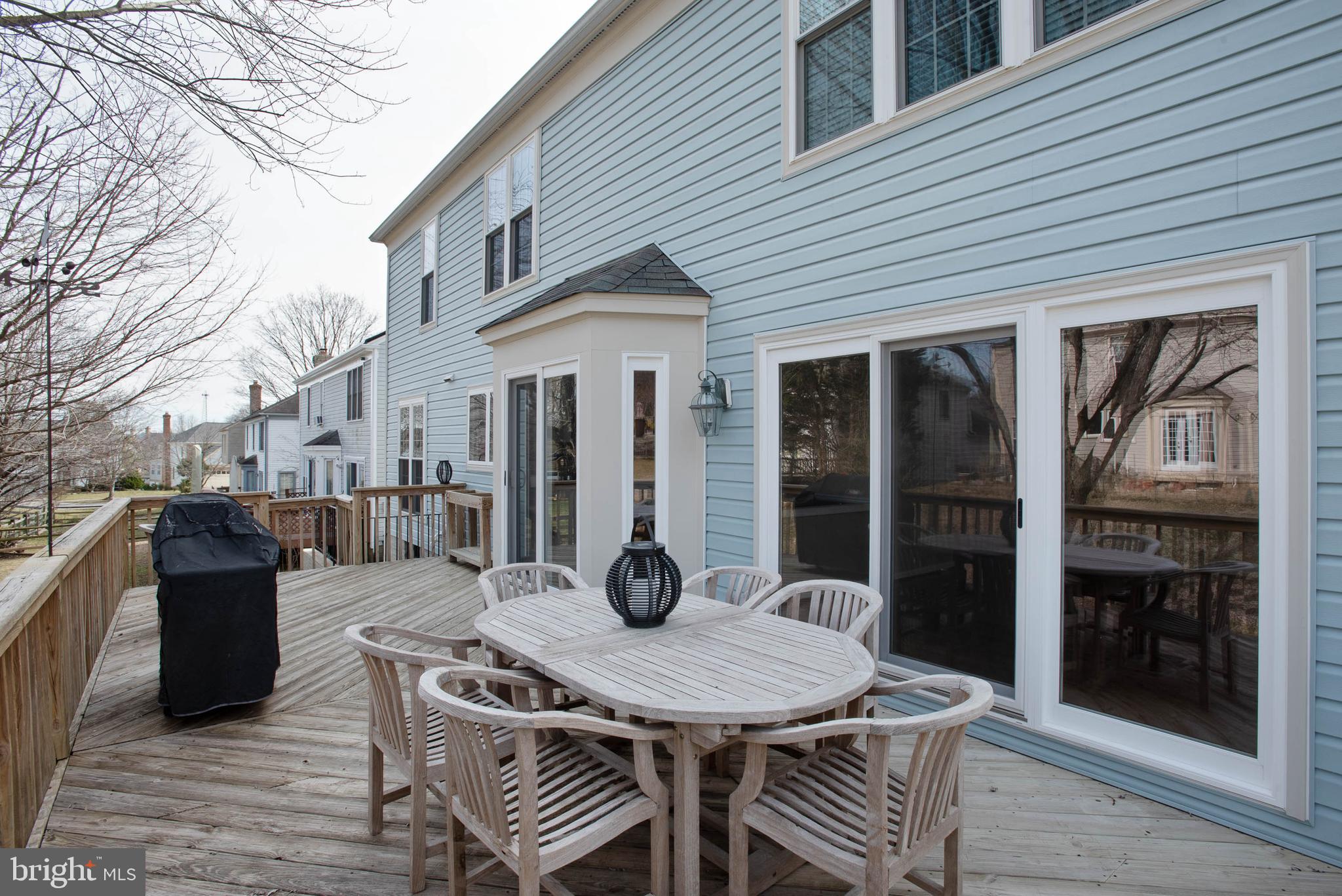 8608 Ashcroft Drive Laurel, MD 20708 - Photo 40 of 45 a view of a patio with table and chairs