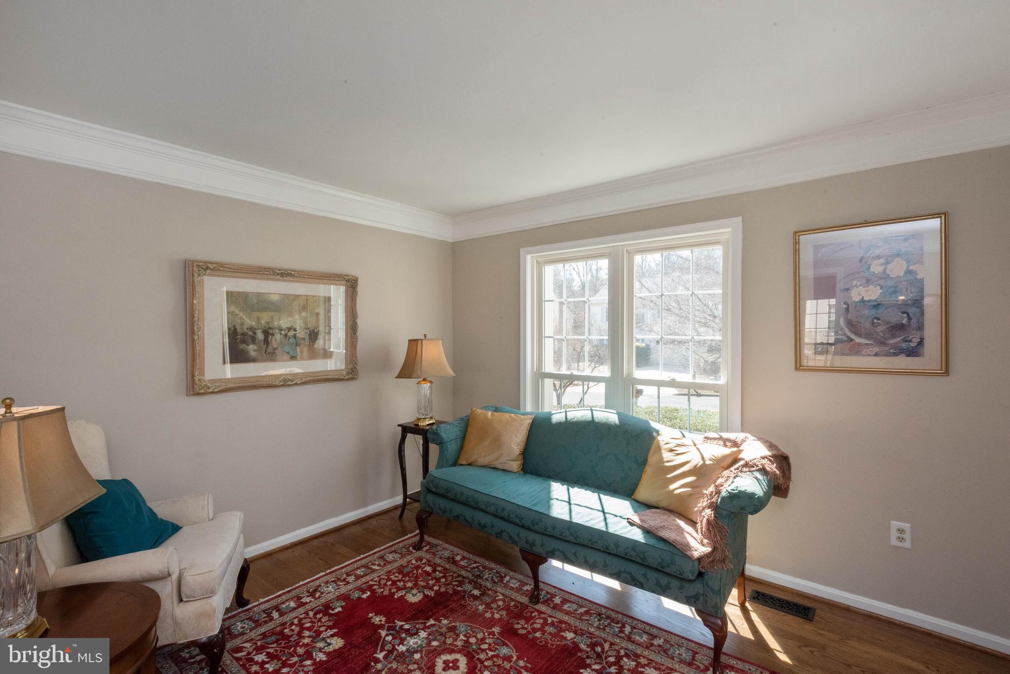 8608 Ashcroft Drive Laurel, MD 20708 - Photo 5 of 45 a living room with furniture and a window