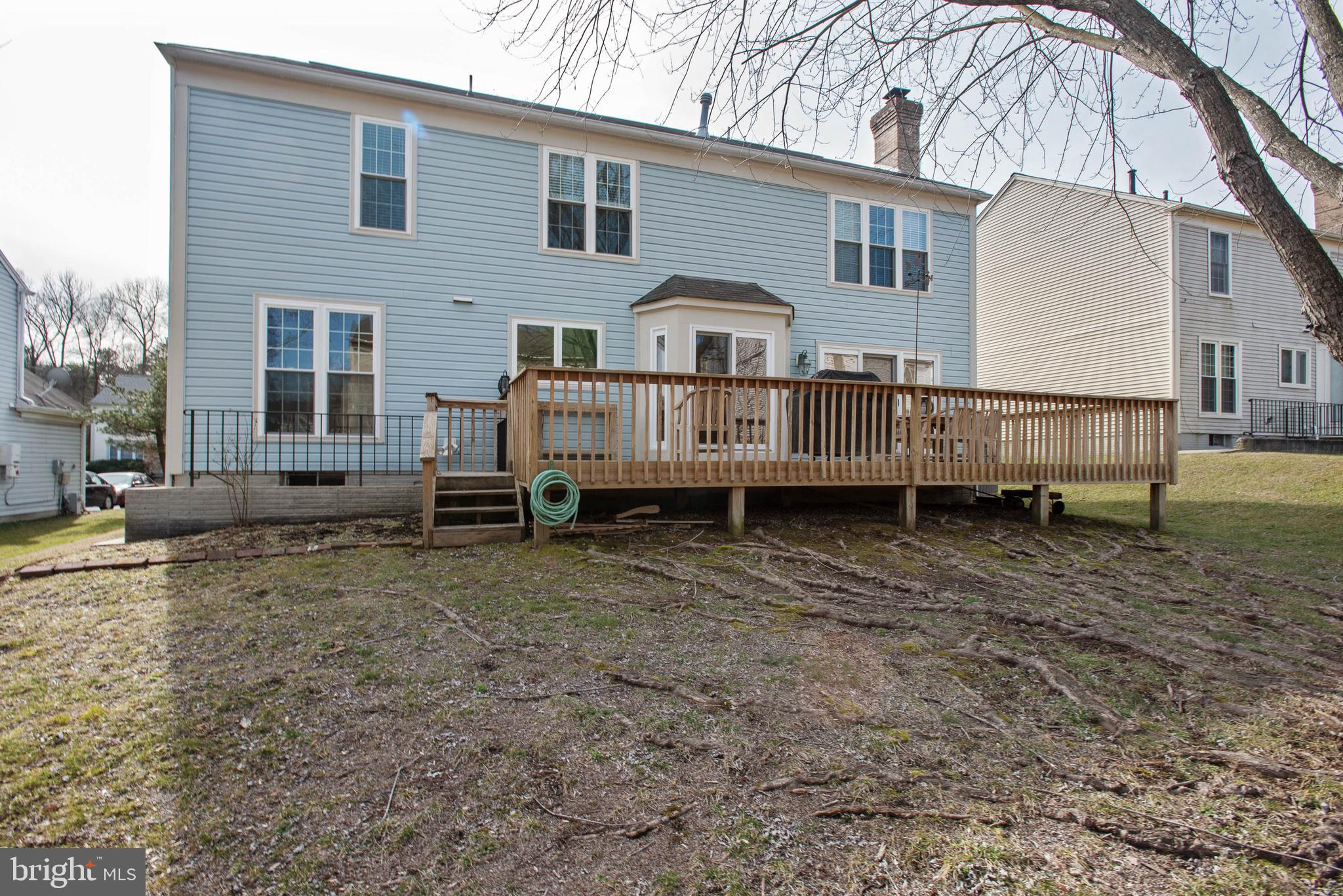 8608 Ashcroft Drive Laurel, MD 20708 - Photo 43 of 45 a view of a house with a yard and sitting area