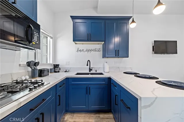 a bedroom with a bed and table