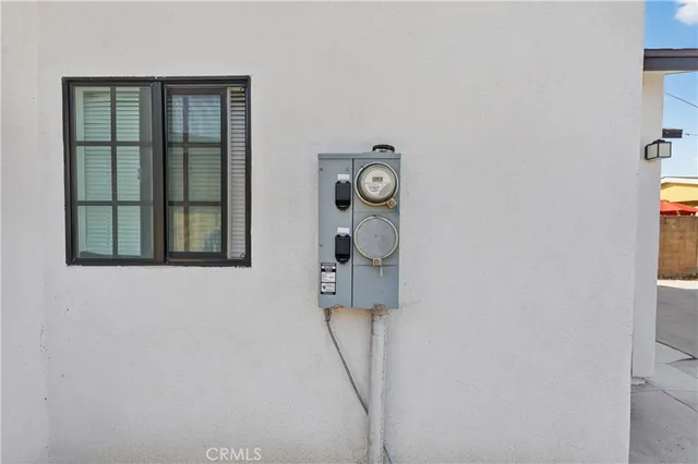 an aerial view of a house with a yard basket ball court and outdoor seating
