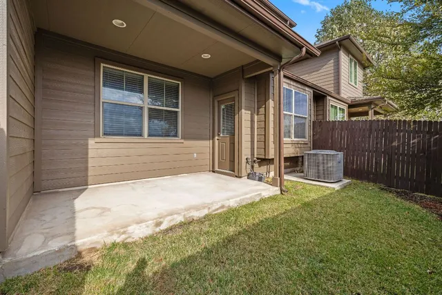 a backyard of a house with seating space