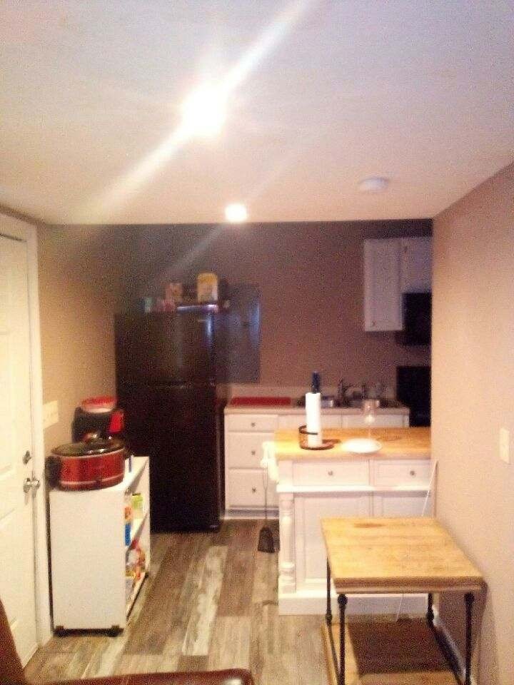 601 Bullock Street Columbia, TN 38401 - Photo 14 of 16 a kitchen with a sink cabinets and appliances