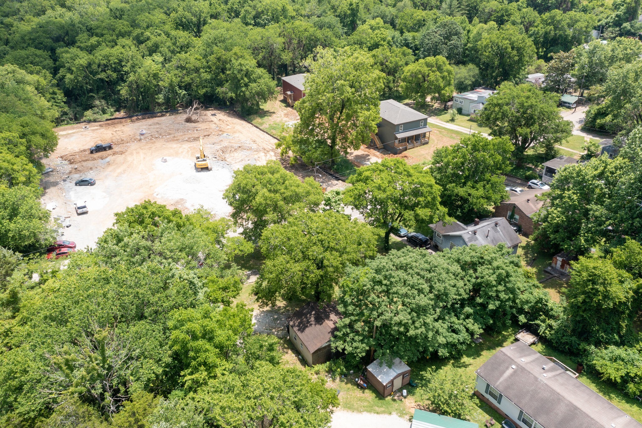 601 Bullock Street Columbia, TN 38401 - Photo 9 of 16 an aerial view of residential house with outdoor space and trees all around