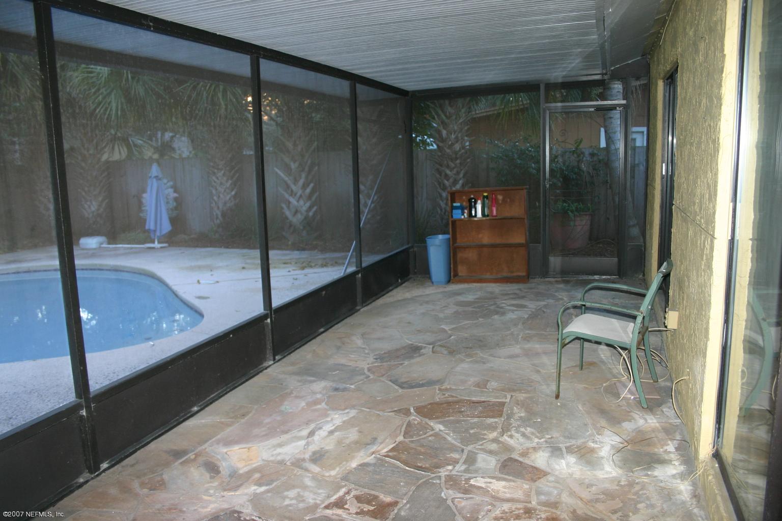 2105 Bay Road Neptune Beach, FL 32266 - Photo 19 of 19 Screened patio w/slate floor
