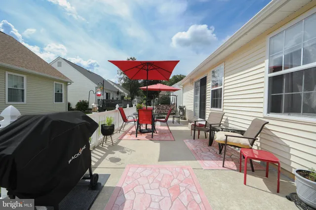 a view of a tables and chairs in patio