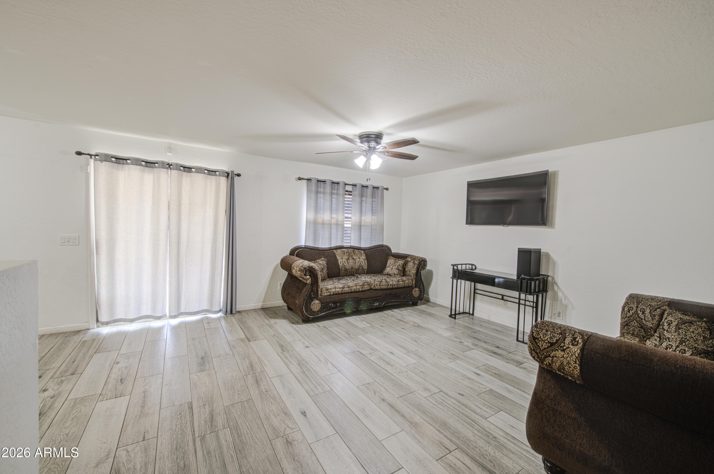 8315 West Cordes Road Tolleson, AZ 85353 - Photo 7 of 49 Living Room 1