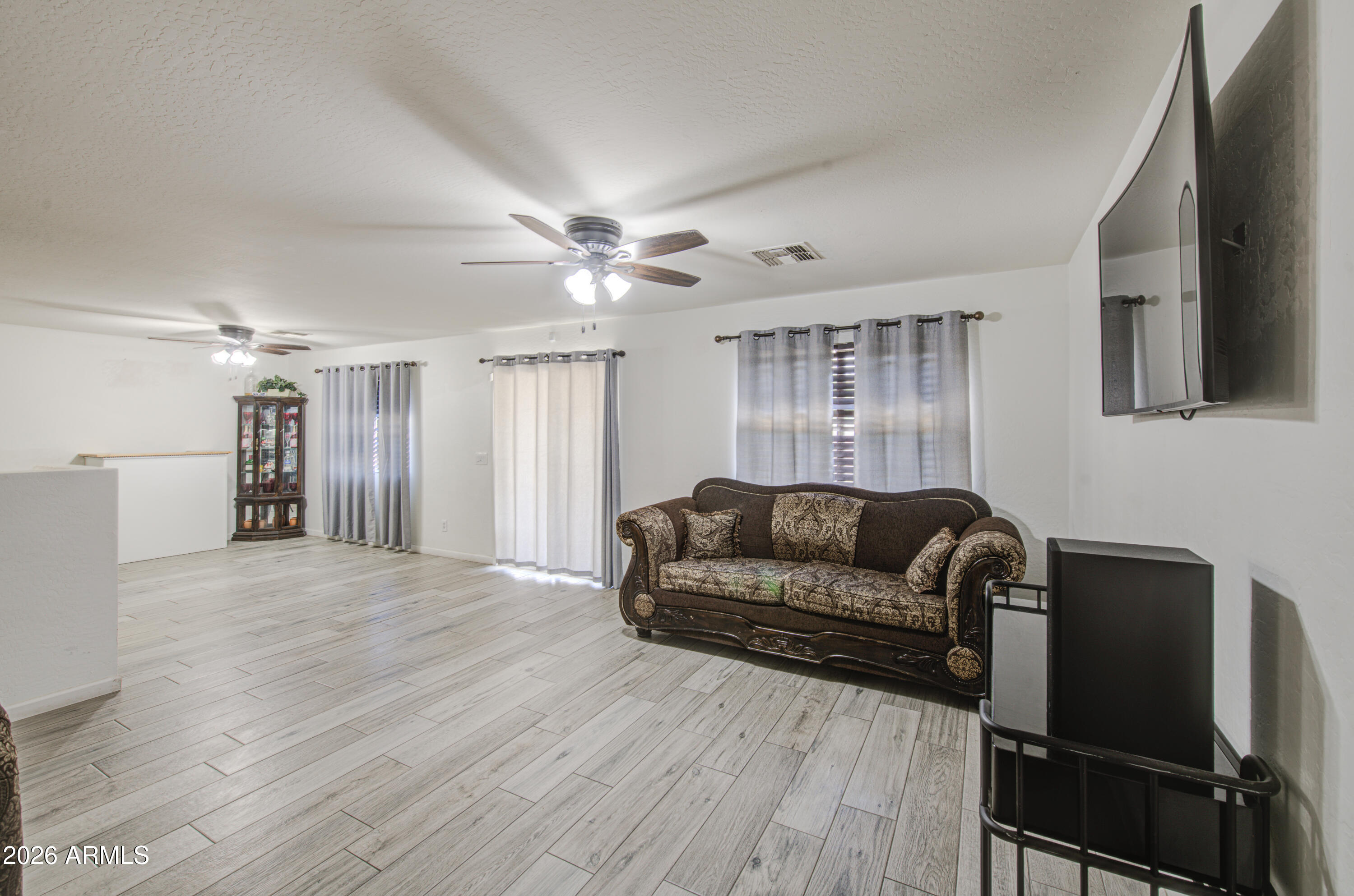8315 West Cordes Road Tolleson, AZ 85353 - Photo 8 of 49 Living Room 2