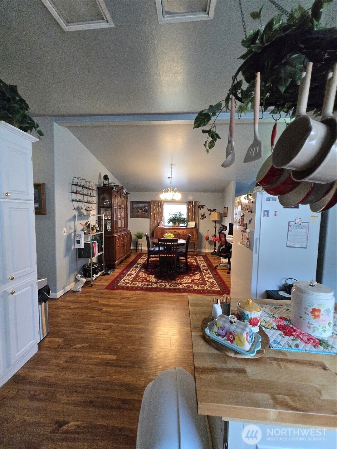 1466 Ferrier Road Winlock, WA 98596 - Photo 5 of 33 a room with lots of chairs and wooden floor