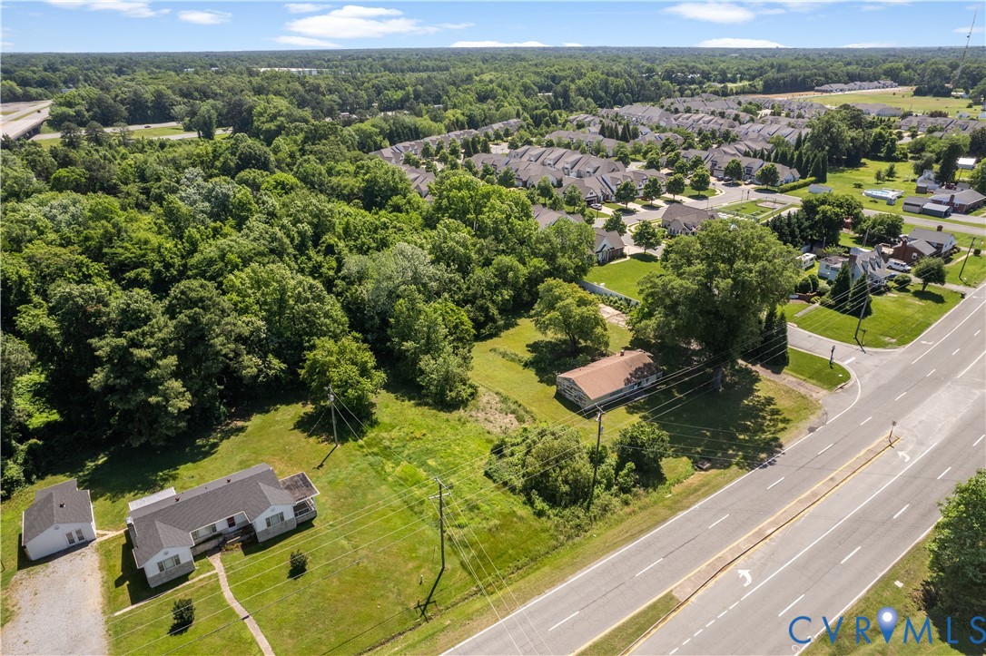 8212 Shady Grove Road Mechanicsville, VA 23111 - Photo 3 of 7 an aerial view of a house with a yard