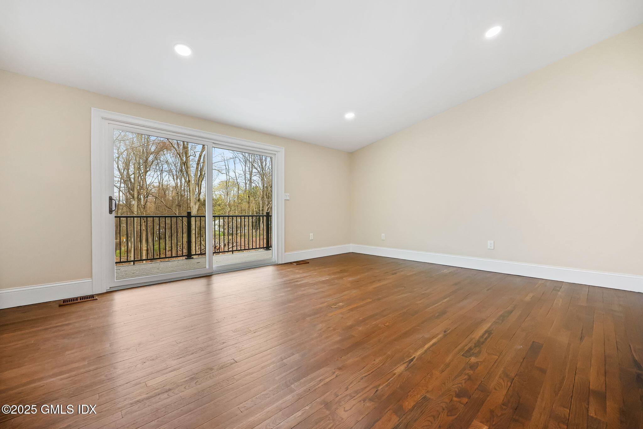 17 Nutmeg Drive Greenwich, CT 06831 - Photo 14 of 35 wooden floor in an empty room with a window