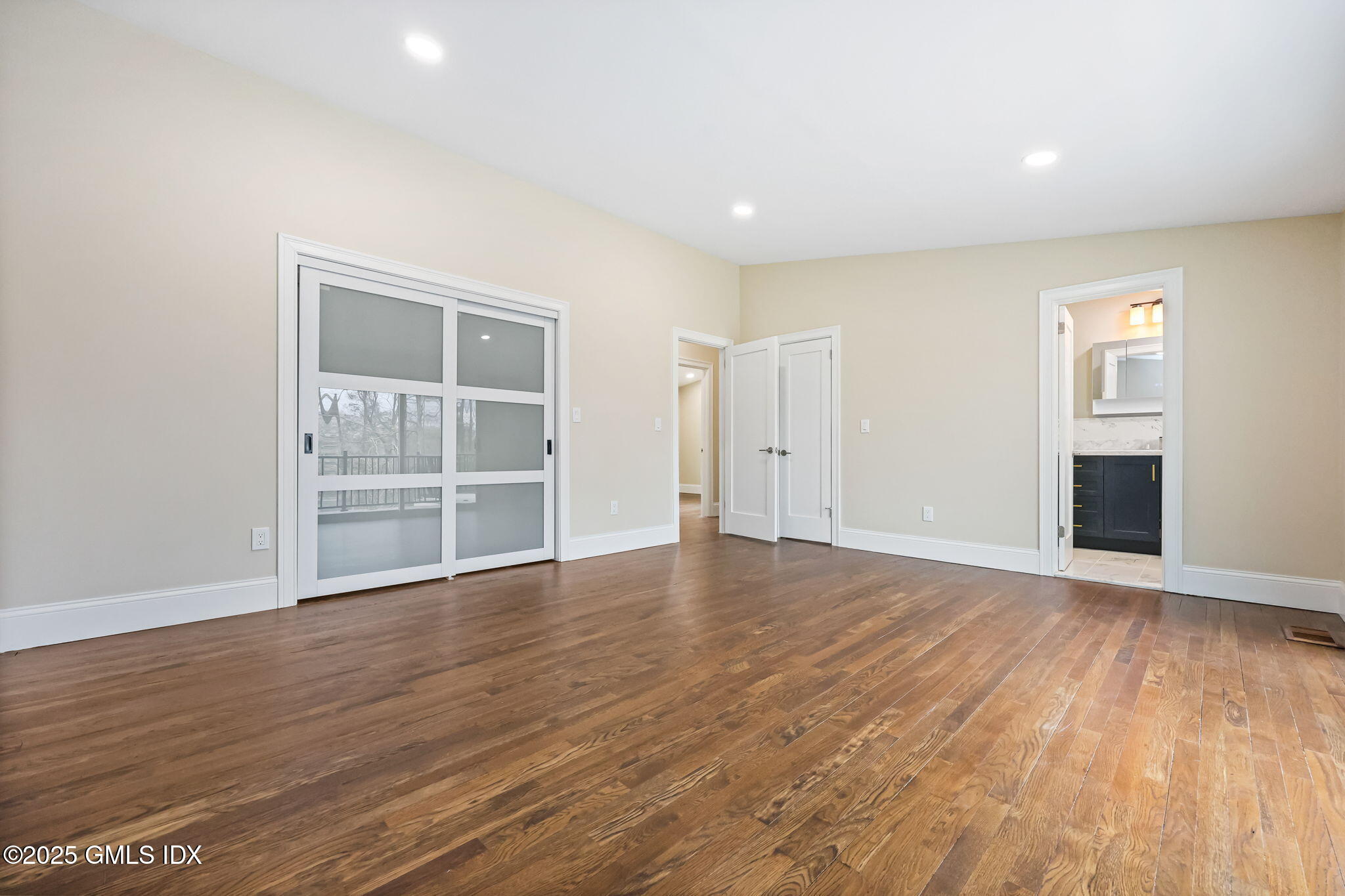 17 Nutmeg Drive Greenwich, CT 06831 - Photo 15 of 35 a view of empty room with wooden floor