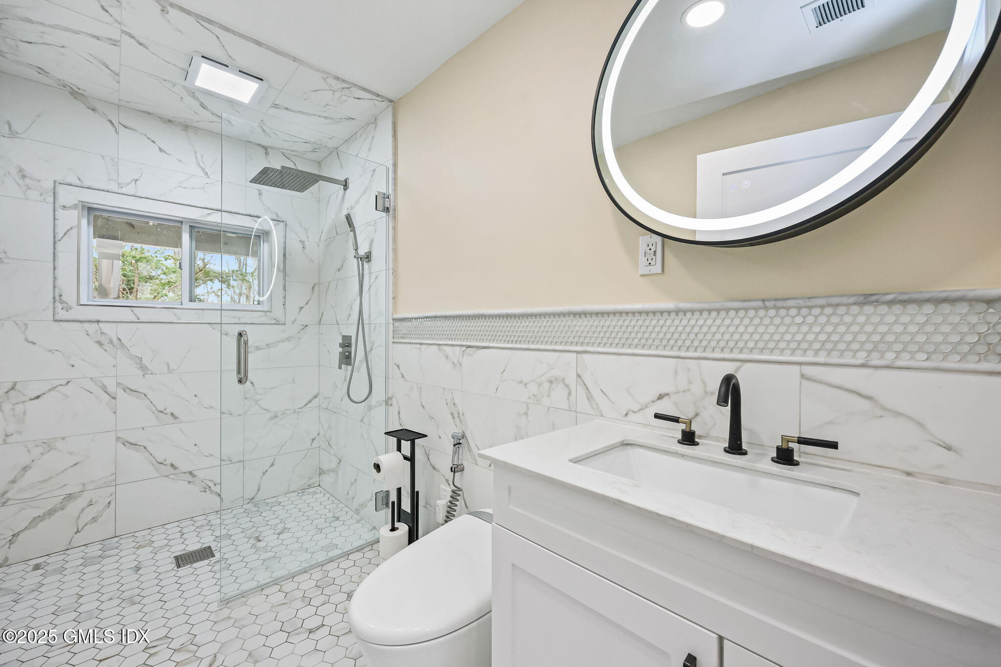 17 Nutmeg Drive Greenwich, CT 06831 - Photo 31 of 35 a bathroom with a sink a toilet and shower