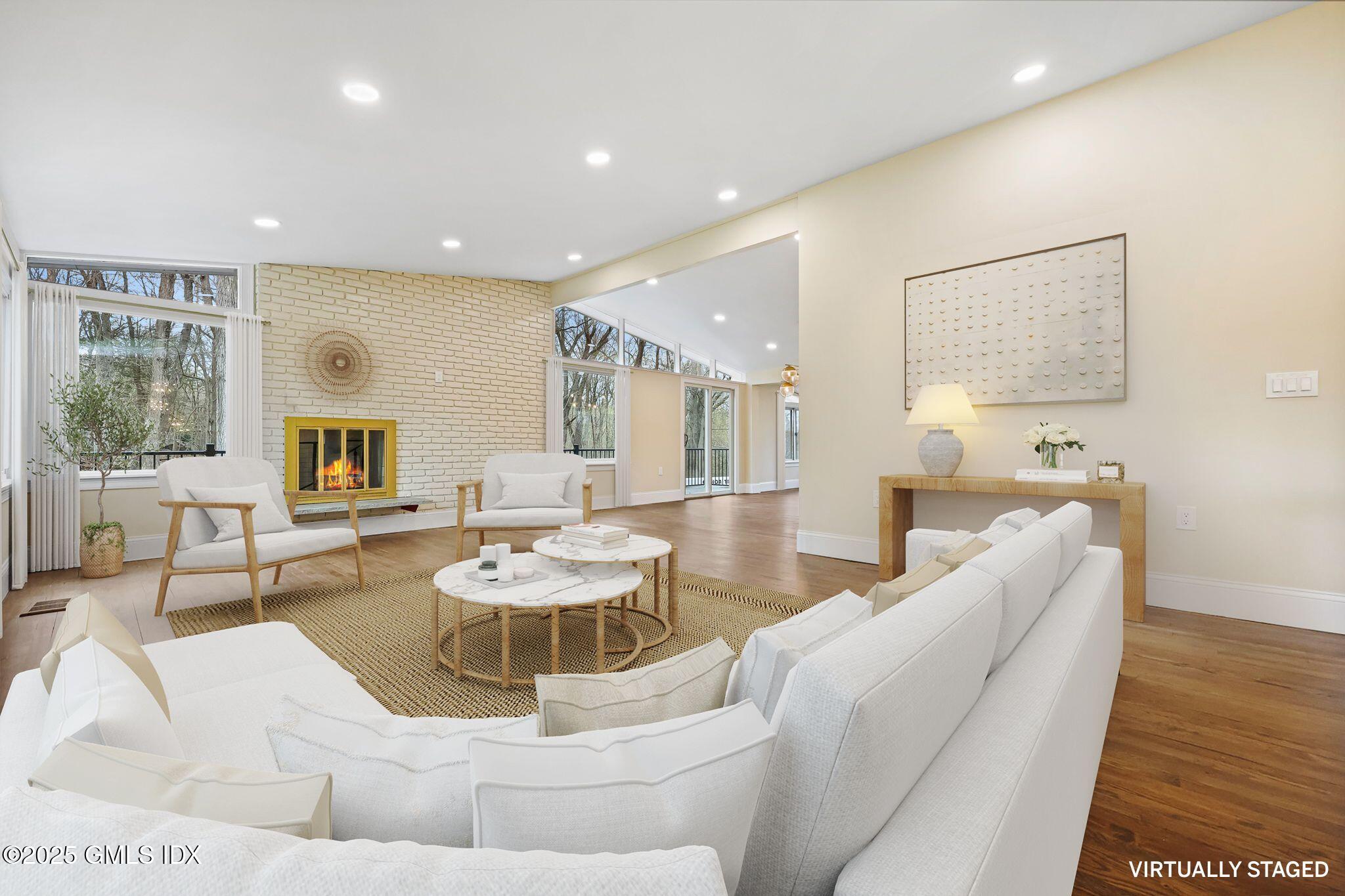 17 Nutmeg Drive Greenwich, CT 06831 - Photo 6 of 35 a living room with furniture and a wooden floor