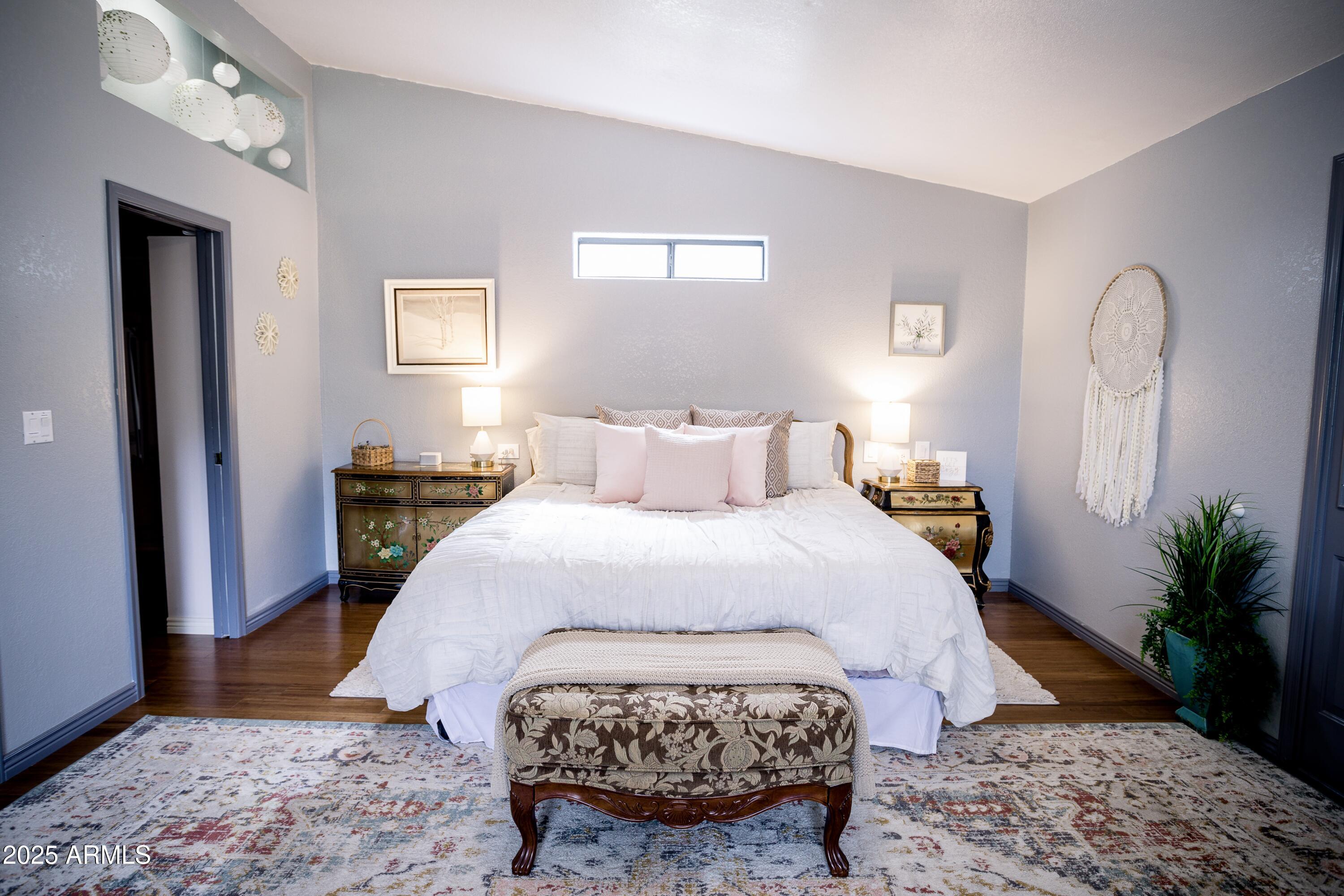 29 East Ramsey Canyon Road Hereford, AZ 85615 - Photo 94 of 119 a bedroom with a bed and a potted plant