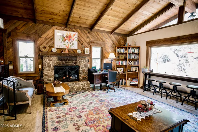 a kitchen with stainless steel appliances a sink a stove and cabinets